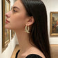 ⏳Limited-time 50% off⏰Women’s Elegant Twisted Gold Hoop Earrings👂🎏